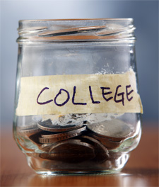 This image shows a glass jar marked with the word "college" and filled with a few coins. It represents the financial difficulties faced by college-bound students and their families who are attempting to pay for increasing college costs while they themselves may be struggling economically.