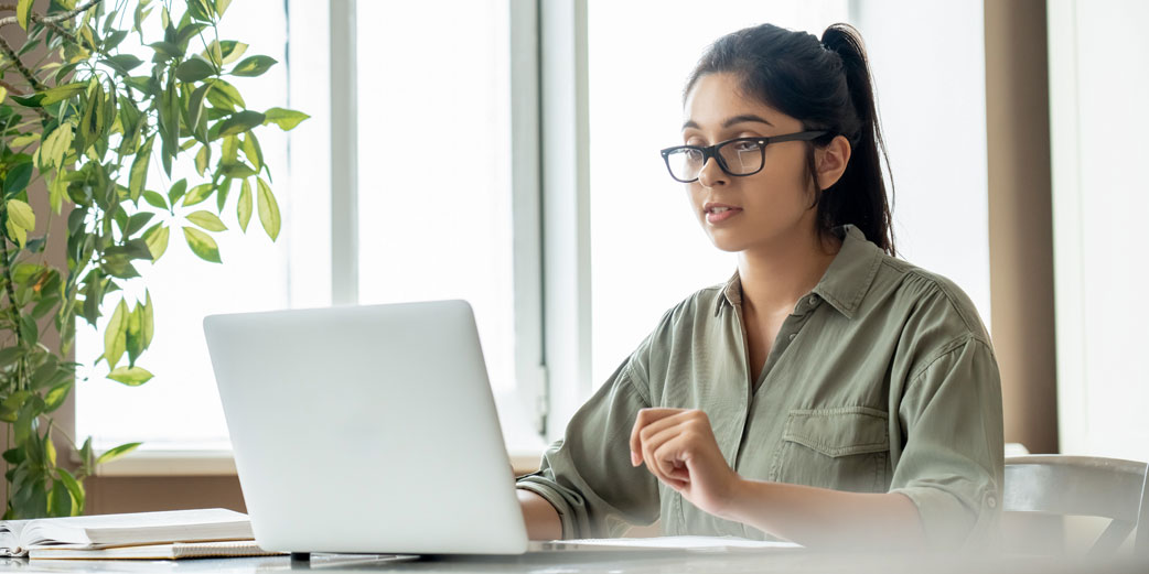 How satisfied are your online learners? Female student seated at her computer