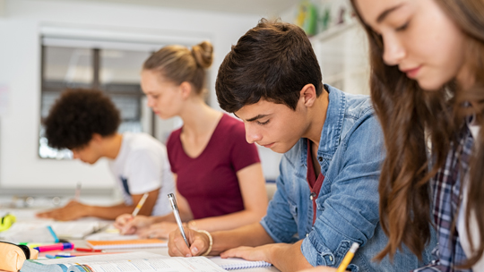 College Planning: High school students doing homework