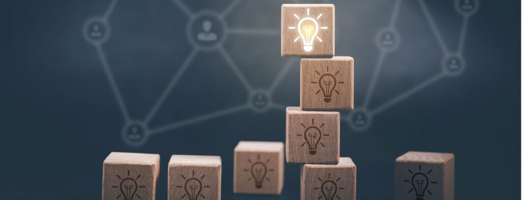 2022 Fundraising Blogs: Wooden blocks with lightbulbs