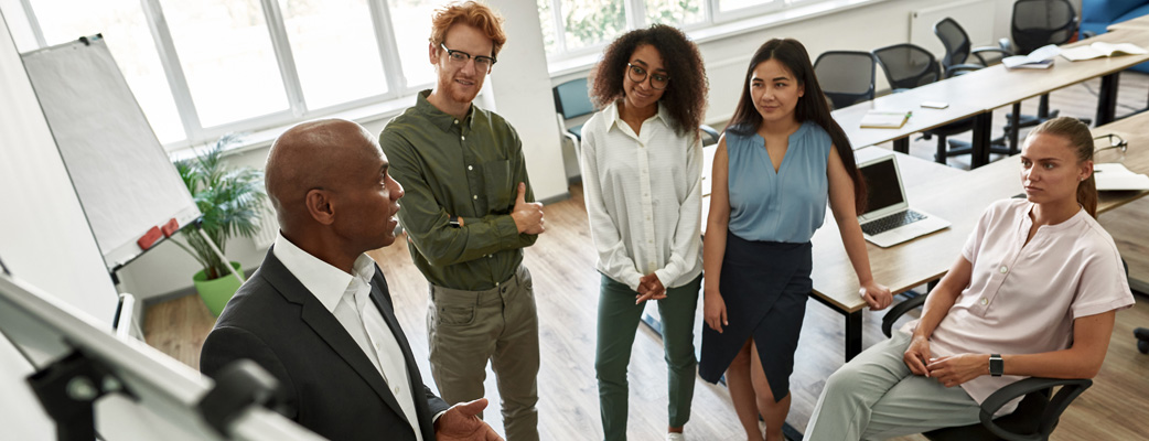 Cross-training enrollment staff in a campus conference room