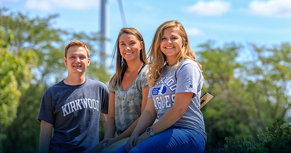 Blog on job shadowing: 1 male and two female students sitting and smiling